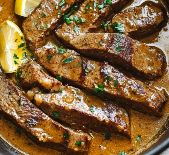 steak-bites-searing.jpg" alt="Garlic Butter Steak Bites cooking in skillet